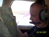 Spencer looking at the flight map prior to takeoff